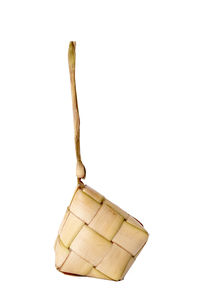 High angle view of apple hanging over white background