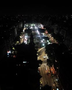 Aerial view of illuminated city at night