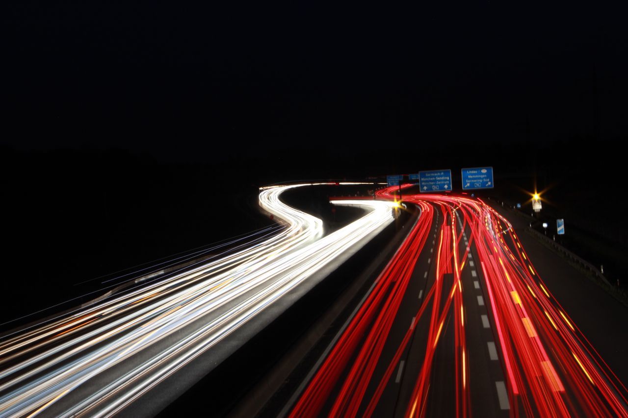 light trail, illuminated, long exposure, motion, speed, night, blurred motion, transportation, red, city, traffic, tail light, road, highway, no people, glowing, city life, street, architecture, copy space, outdoors, multiple lane highway, vehicle light