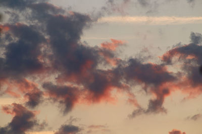 Low angle view of dramatic sky during sunset