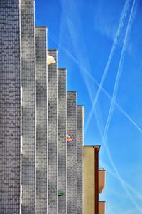 Low angle view of building against blue sky