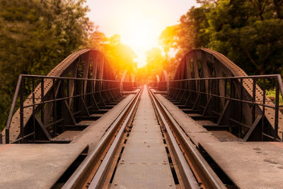 View of footbridge at sunset