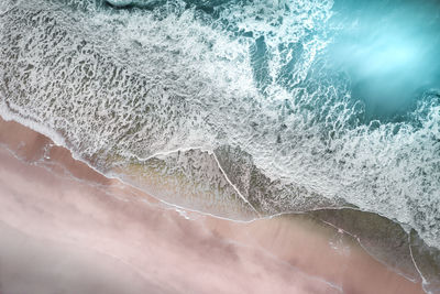 Close-up of water flowing through rocks