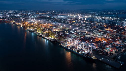  shipping port and container cargo ship  logistics transportation international on deep sea at night  