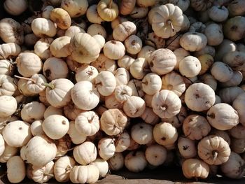 Full frame shot of onions for sale at market