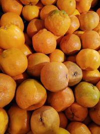 Full frame shot of oranges in market