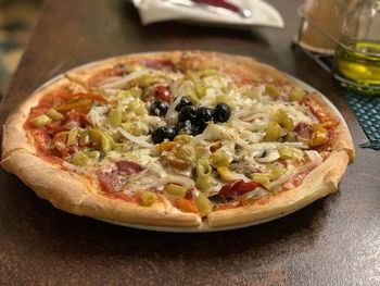 High angle view of pizza in plate on table