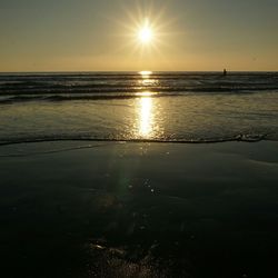 Scenic view of sea at sunset