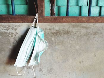 Close-up of clothes drying on wall