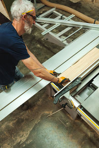 High angle view of man working in factory