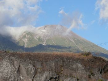 Panoramic view of volcanic landscape against sky