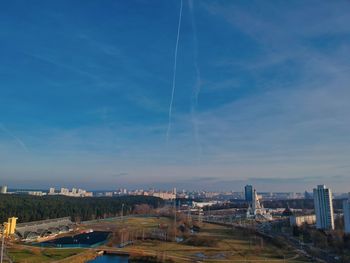 Aerial view of cityscape against sky