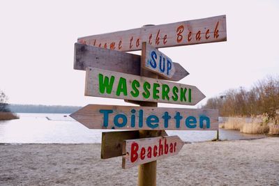 Close-up of signboard against clear sky