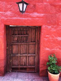 Closed door of red house