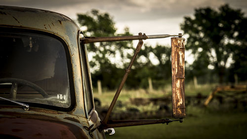 Close-up of abandoned car