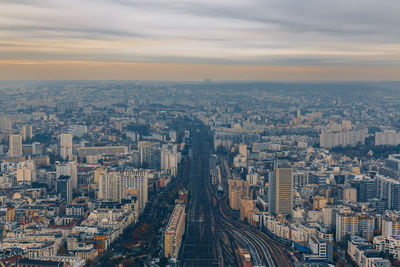 Aerial view of cityscape against sky