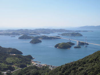 High angle view of bridge over sea against sky