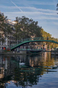 Bridge over river against sky