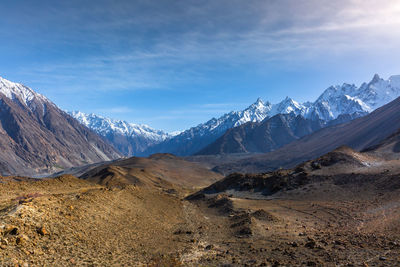 Scenic view of snowcapped mountains against sky