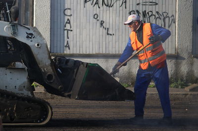 Man working on motorcycle