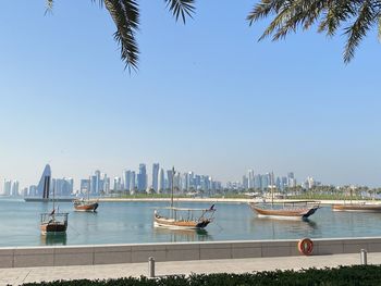 Traditional gulf boats and modern skyscrapers 