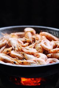 Shrimps being cooked in pan