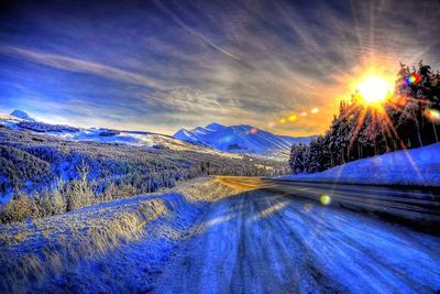 Scenic view of landscape against sky during sunset