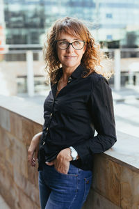 Young woman standing in city
