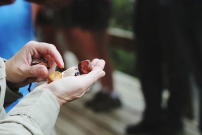 Close-up of woman hand holding cigarette