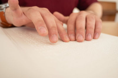 Cropped image of woman holding hands