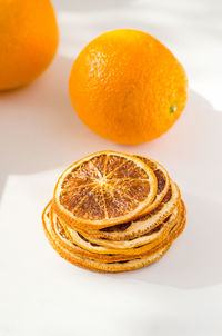 Close-up of oranges on white background