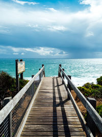 Pier on sea against sky