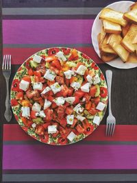 Directly above shot of chopped vegetables on plate