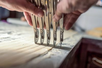 Close-up of hands on table