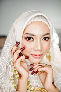 Portrait of a beautiful young woman for akad nikah ceremony