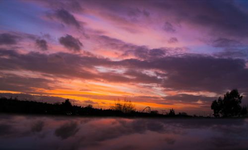 Scenic view of dramatic sky during sunset