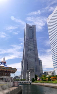 Modern buildings in city against sky