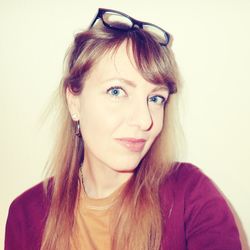 Portrait of a beautiful young woman over white background