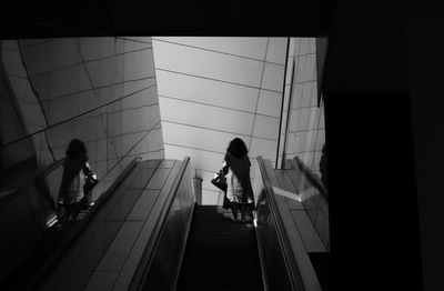 People on escalator