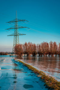 Frozen field and trees after flooding, germany,