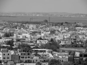 High angle view of buildings in city against clear sky