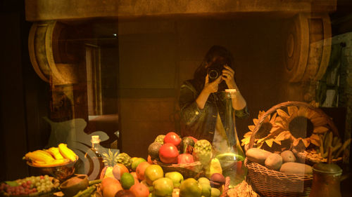 Woman holding fruits