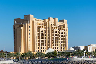 Buildings against blue sky