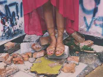 Low section of woman standing on floor