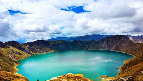 Scenic view of quilotoa against cloudy sky