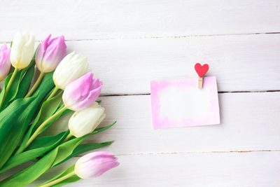 Directly above shot of pink tulips on table
