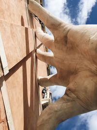 Low angle view of man against sky