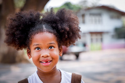 Close-up of girl looking away