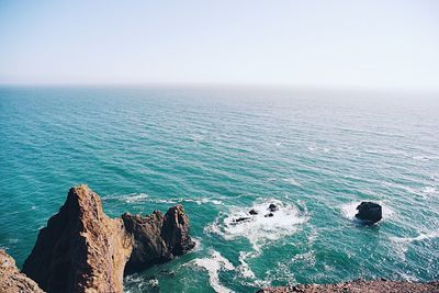 Scenic view of sea against clear sky