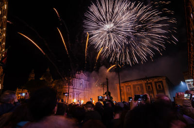 Firework display at night